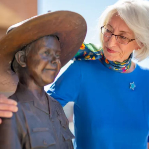 Linda Pauling- Founder of the mission with statue of her late son Chris Greicius (First Make-A-Wish Child)