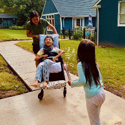 Wish Kid James enjoying his wheelchair-accessible backyard!